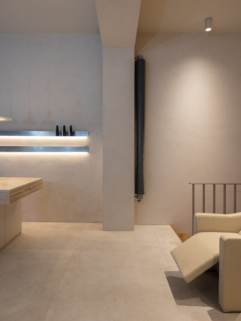 Backlit stainless steel shelf at circlé salon, Bratislava