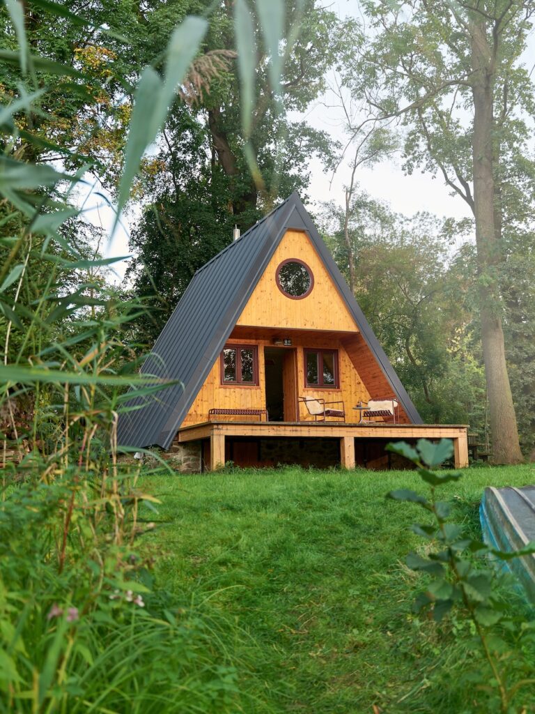 A-frame cottage with a custom stainless steel kitchen inside