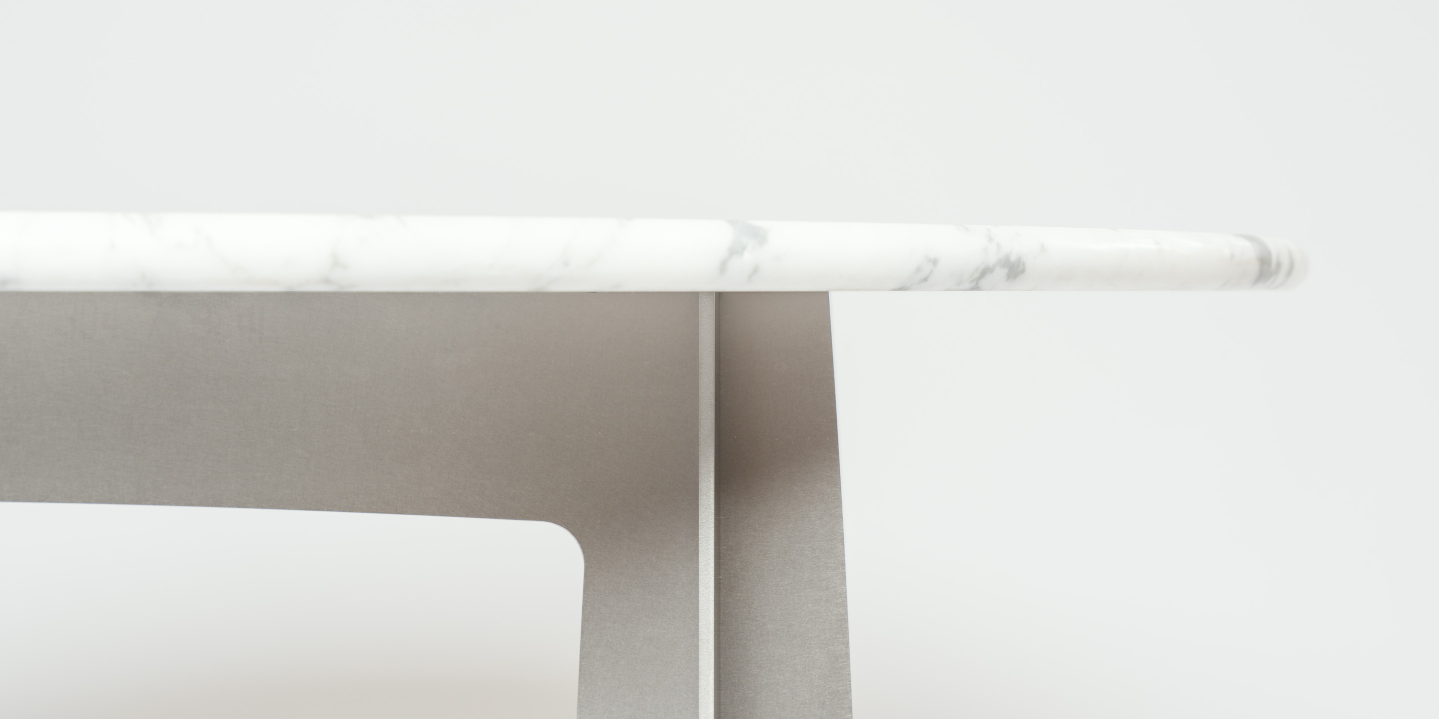 Flo 120 stainless steel dining table with Bianco Carrara marble top by inox système